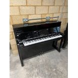 Kawai (c2015) A model K200 114cm high upright piano in a bright ebonised case; fitted with a