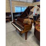 Steinway (c1932) A 5ft 7in Model M grand piano in a mahogany case on square tapered legs.