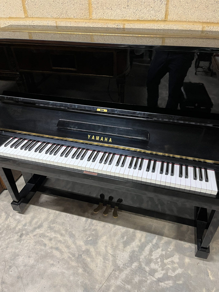 Yamaha (c1961) A Model U3 upright piano in a traditional bright ebonised case; together with a - Image 2 of 5