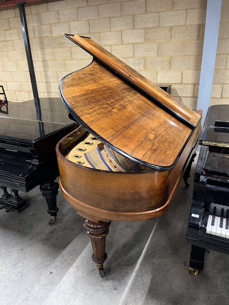 Blüthner (c1897) A 6ft 11in grand piano in a rosewood case on turned and fluted legs. - Image 9 of 10