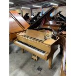 Steinway (c1927) A 5ft 10in Model O grand piano in a light mahogany case on square tapered legs;