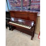 Steinway (c1921) A Model K upright piano in a mahogany case; together with a duet stool.