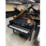 Kawai (c2007) A 5ft 10in Model RX2 grand piano in a bright ebonised case on square tapered legs.