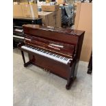 Petrof (c2014) A Model 118 upright piano in a bright mahogany case.