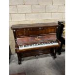 Steinway (c1891) A Model E upright piano in a rosewood frame.