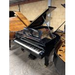 Steinway (c1920) A 6ft 11in Model B grand piano in a bright ebonised case on square tapered legs;