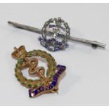 A 9 carat gold and enamel Royal Medical Corps sweetheart brooch, Birmingham 1960, 3.1cm long, 4.