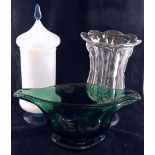 A Victorian hand blown green glass pedestal vase of elongated form,