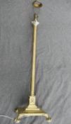 An early 20th century brass telescopic Corinthian column standard lamp,