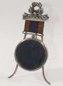 A silver medal or medallion holder, 5.