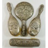 Thirteen silver backed brushes and hand mirrors,