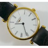 A ladies Longines gold plated wrist watch, the white face with Roman numerals, in gold plated case,