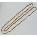 A yellow metal anchor link chain, 87cm long, 37.