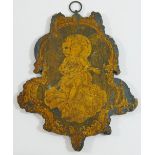 A small pine cartouche-shaped fretwork panel, depicting the Christ child painted in black and gold,