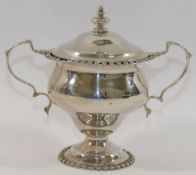 A small late Victorian silver two-handled pedestal lidded trophy cup, London 1895, 5.44ozt, 169.