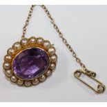 A Victorian oval amethyst and half pearl brooch, the back stamped '15CT', 2.