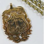 A 9 carat gold medal, Birmingham 1900, 11.