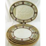 A large quantity of Minton 'Chinese Key' dinnerware comprised of two large oval serving plates,