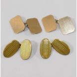 A pair of oval engine turned yellow metal cuff links and another pair of plain rectangular cuff