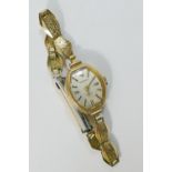 A ladies 9 carat gold cased 'Everite' watch with gold plated bracelet strap,