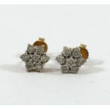 A pair of diamond daisy head cluster earrings, the eight-cut meleè diamonds in illusion setting,