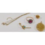 A gold locket, a paste and synthetic ruby set cluster ring with gold shank,