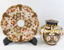 An early 20th century Royal Crown Derby Imari pattern high sided dish with red printed factory mark