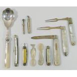 Two Georgian silver and mother of pearl folding fruit forks,