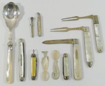 Two Georgian silver and mother of pearl folding fruit forks,