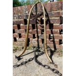 A pair of 19th century brass and iron horses hames, with leather strap, stamped 'Patent,