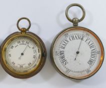 A circular pocket aneroid barometer, in gold plated case, 4.