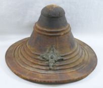 A 19th century Omani circular parrying shield or buckler, of typical conical form,