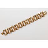 An Art Deco heavily gold plated hollow link bracelet,