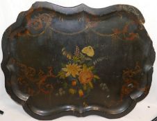 A large Victorian papier machè cartouche-shaped tray, decorated with flowers,