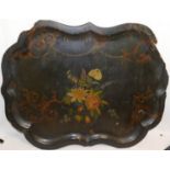 A large Victorian papier machè cartouche-shaped tray, decorated with flowers,