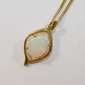 A yellow metal opal set pendant, 2.