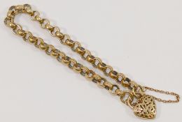 A yellow metal belcher link bracelet, alternate links with engraved decoration,