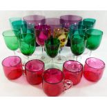 A collection of 16 Victorian and later coloured glass drinking glasses including green, purple,