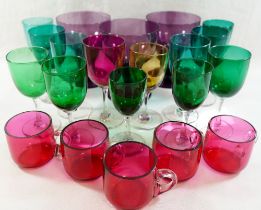 A collection of 16 Victorian and later coloured glass drinking glasses including green, purple,