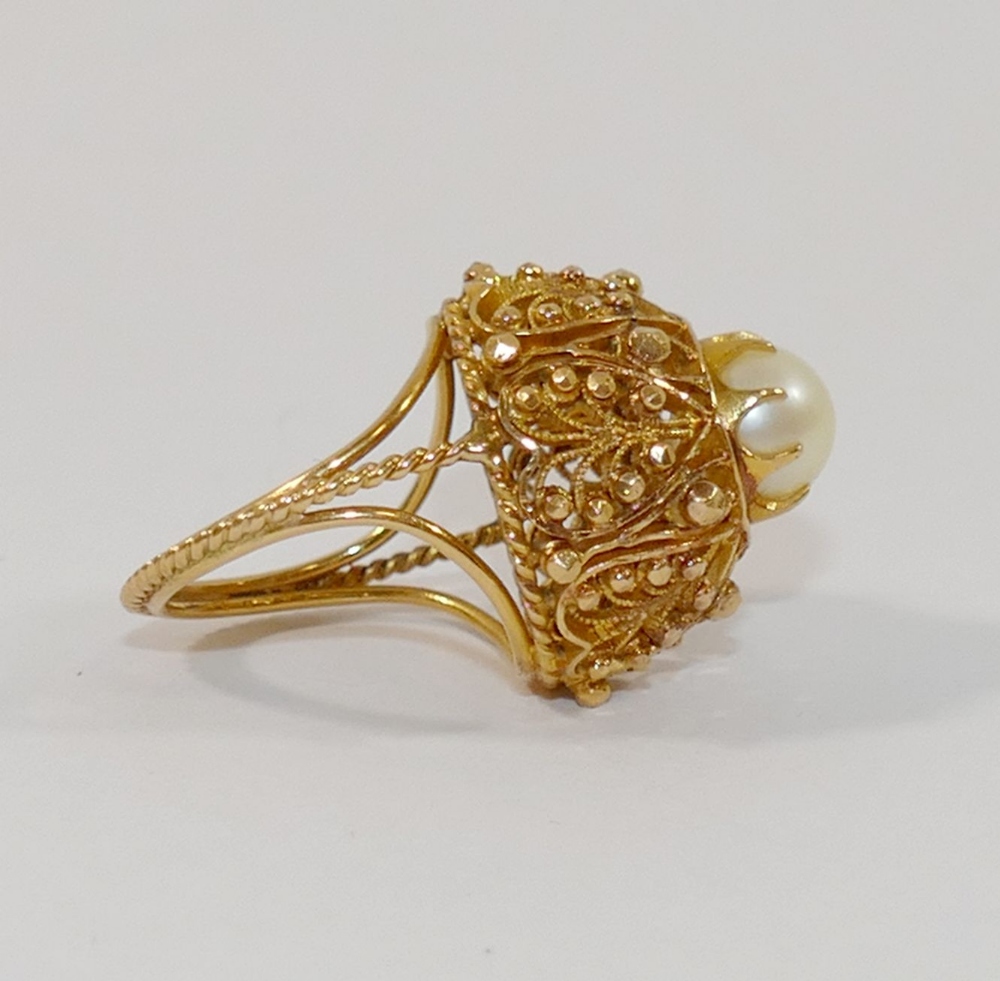 An Indian yellow metal bombè-shaped ring, set with single cultured pearl, stamped '22C', - Image 2 of 6