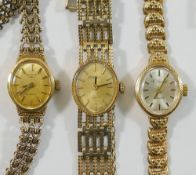 Three 9 carat gold cased ladies wrist watches, comprised of a Rotary and two H Samuel examples,