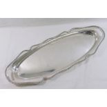 An Edwardian oval silver two-handled tray, the flared and shaped rim with gadrooned edge,