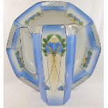 An Art Nouveau wash jug and bowl, with floral transfer printed decoration and panelled sides,