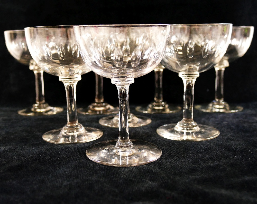 A set of eight champagne bowls, each cut with a band of seventeen small oval panels around the bowl, - Image 2 of 2