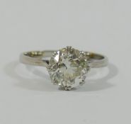 A early 20th century diamond single stone ring, the old cut stone approximately 2.