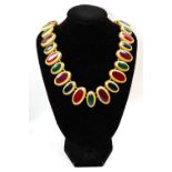 A red, green and blue enamel gold plated oval panel necklace by Anne Klein,