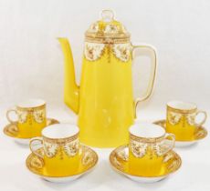 A Royal Worcester yellow ground coffee pot and four cups and saucers, with date mark for 1903,