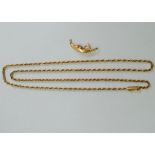 A yellow metal rope twist chain, with barrel clasp, stamped '18K', 64.5cm long, 16.