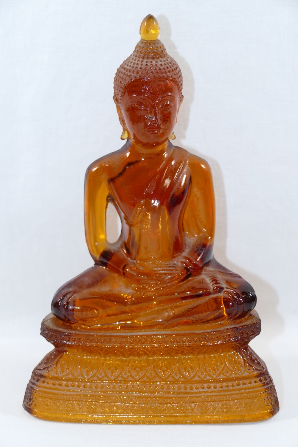 An amber glass seated Buddha, - Image 3 of 3