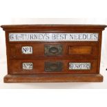 A late Victorian set of counter top 'G L Turney's Best Needles' drawers,